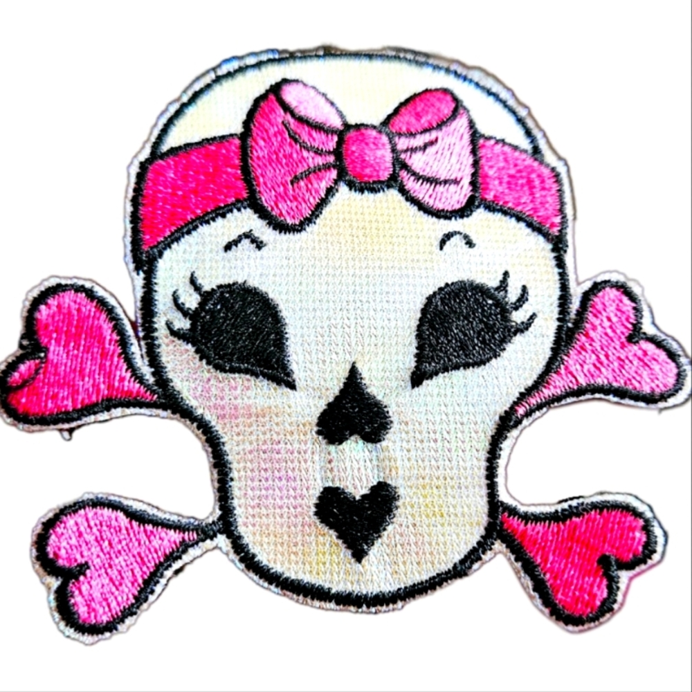 HOLOGRAPHIC WHITE/PINK SKULL & CROSSBONES WITH A BOW FABRIC IRON-ON PATCH!